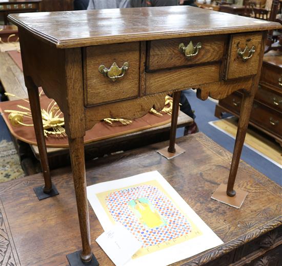 A George III oak lowboy, W.2ft 6in.